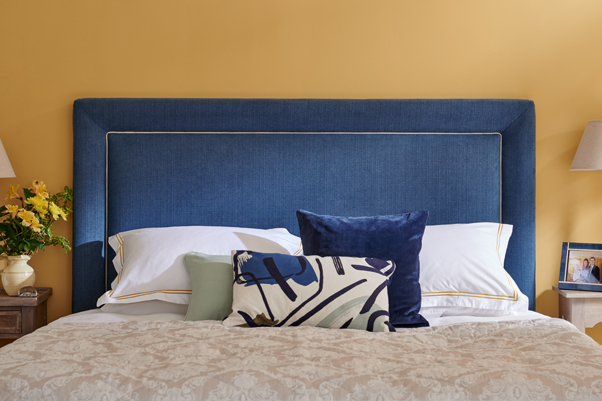 Ghia Padded Border Headboard upholstered in House Chenille Navy with Contrast Piping in Pure Cotton Natural