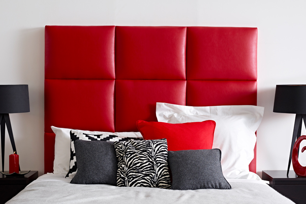 Geometric Block Style Skye Headboard upholstered in Faux Leather Red in a Farrow & Ball All White painted room