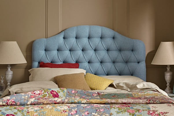 Tean Deep Buttoned Humped Headboard upholstered in Pure Wool Plain Wedgwood Blue Eau De Nil with Self Buttons against Farrow and Ball painted room