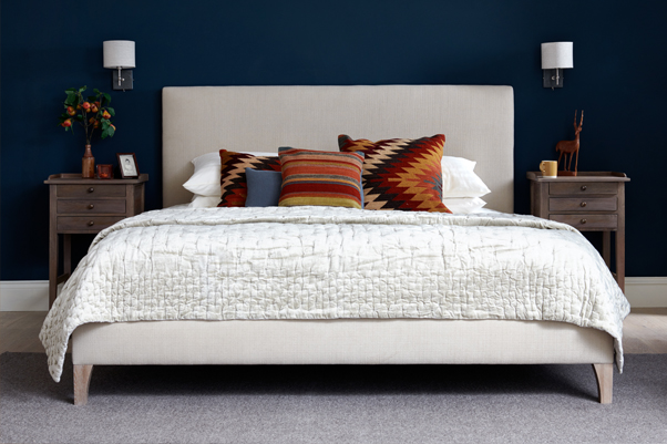 Simple Contemporary Arran Grand Upholstered Bed upholstered in House Chenille Stone in a Farrow and Ball Hague Blue painted room